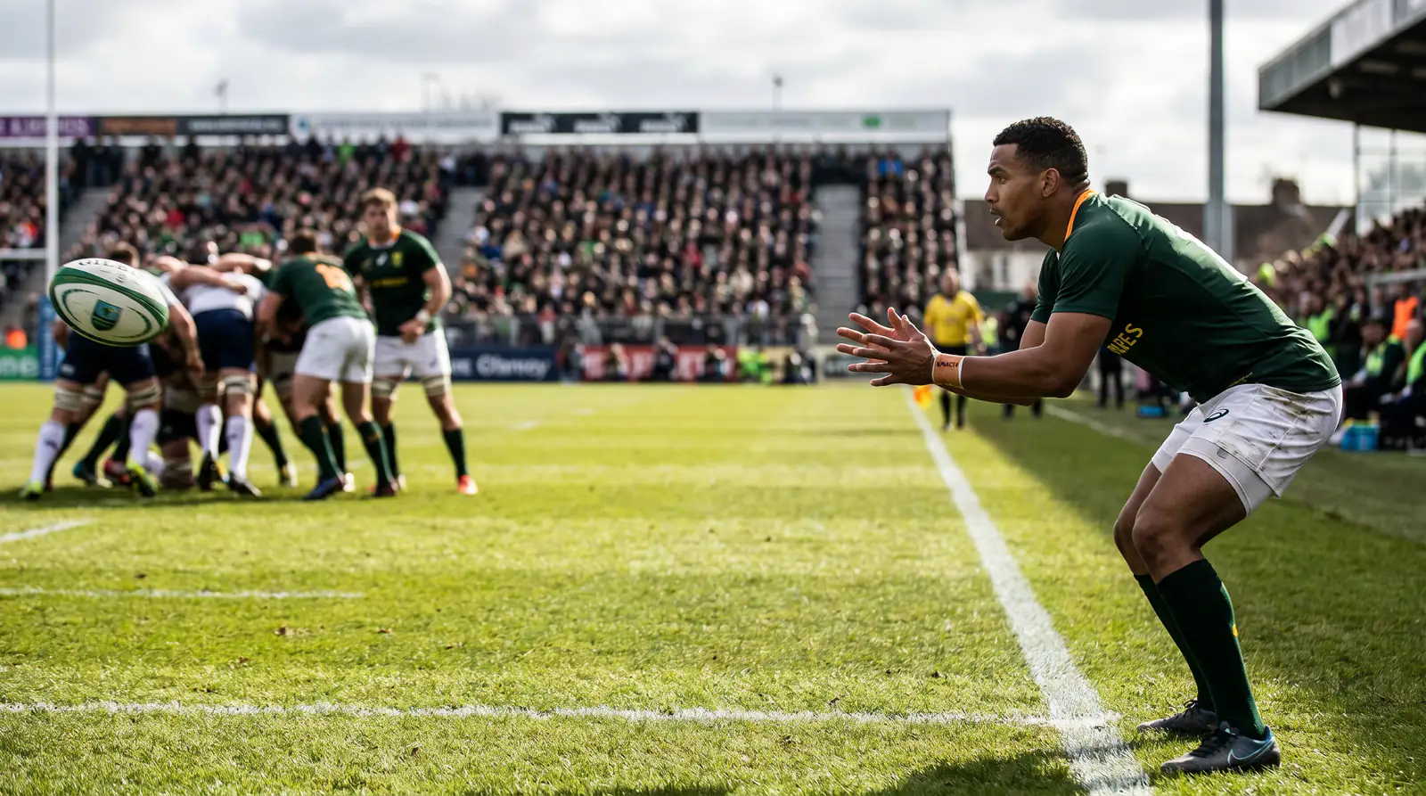 Rugby winger positioned for an anytime try scorer opportunity during the match
